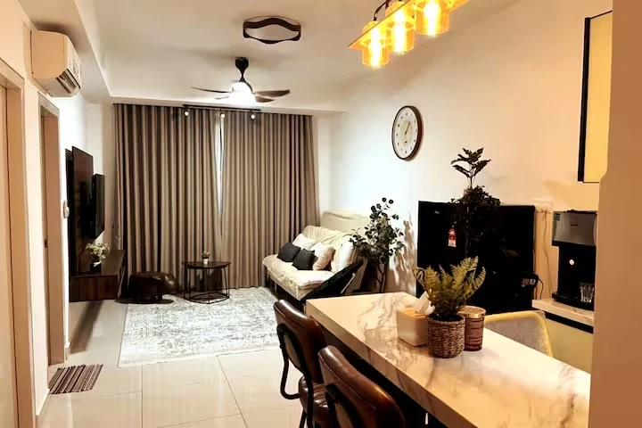 Apartment living and dining area with tiled floors, ceiling fans and a furnished lounge